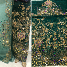 Load image into Gallery viewer, Subtle Teal Green Heavy RhineStone Beaded With Mirror Work Net Lace George Wrapper Set with Blouse   - NLDG300