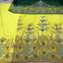 Load image into Gallery viewer, Bloomy Yellow Crystal Stone Beaded Net Lace George Wrapper Set with Green Contrast Blouse   - NLDG306