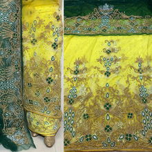 Load image into Gallery viewer, Bloomy Yellow Crystal Stone Beaded Net Lace George Wrapper Set with Green Contrast Blouse   - NLDG306