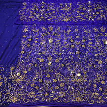 Load image into Gallery viewer, Bold Purple  Heavy Gold Crystal stone Beaded Net Lace George Wrapper Set with  Blouse   - NLDG318