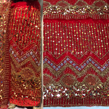 Load image into Gallery viewer, Trending Latest Designer with Beautiful FRINGES work Net Lace Nigerian George Wrapper Set - NLDG131