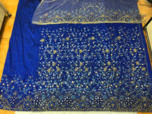 Load image into Gallery viewer, Latest Trending Royal Blue Net fabric Shiny Stone Beaded George wrapper with Gold Blouse - NLDG133