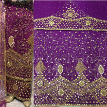 Load image into Gallery viewer, Nigerian bridal wear stone work Net Lace Designer George Wrapper Fabric with blouse - NLDG140
