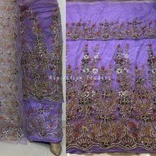 Load image into Gallery viewer, Eye Catching Lavender Heavy Multi Shiny Stone Beaded Net Lace George Wrapper Set with  Blouse   - NLDG314
