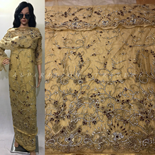Load image into Gallery viewer, Champagne Gold NET Lace Hand beaded Crystal Stonework George Wrapper with Matching Blouse - NLDG072
