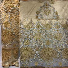 Load image into Gallery viewer, Embroidered and beaded work Net Fabric Champange Gold color Taffeta George Wrapper set- RSG220
