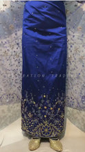 Load and play video in Gallery viewer, Latest Trending Royal Blue Net fabric Shiny Stone Beaded George wrapper with Gold Blouse - NLDG133
